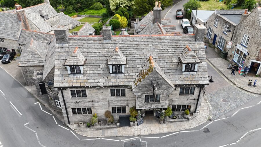 aerial image of a hotel. The building is listed.