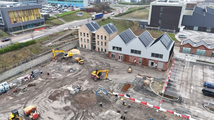 Image of a residential building site, captured by a drone as part of project monitoring services.